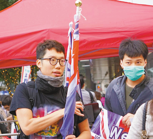 旺暴兩男襲警擾安寧表證成立