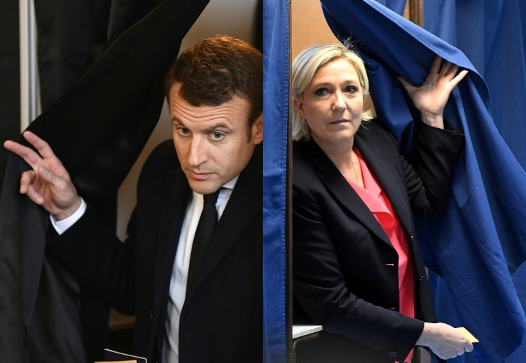 直至当地中午，法国总统选举次轮投票率有28.23%，较2012年总统选举同时段低。图片来源：法新社