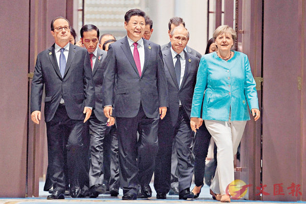 ■習近平將訪問俄羅斯及德國，並出席G20漢堡峰會。圖為去年G20杭州峰會期間，習近平與普京及默克爾互動交流。 資料圖片