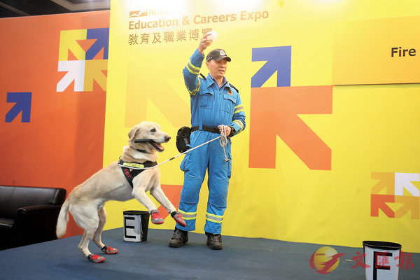 ■吳鈞雄及調查犬「巴斯」。香港文匯報記者莫雪芝 攝